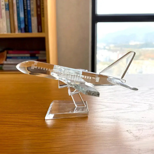 Modern clear crystal aircraft figurine with transparent wings and fuselage on a matching crystalline stand decorbites crystal aircraft