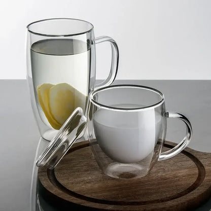 Modern clear double wall tumbler set with bamboo lids showing a clear double wall tumbler with lemon water inside