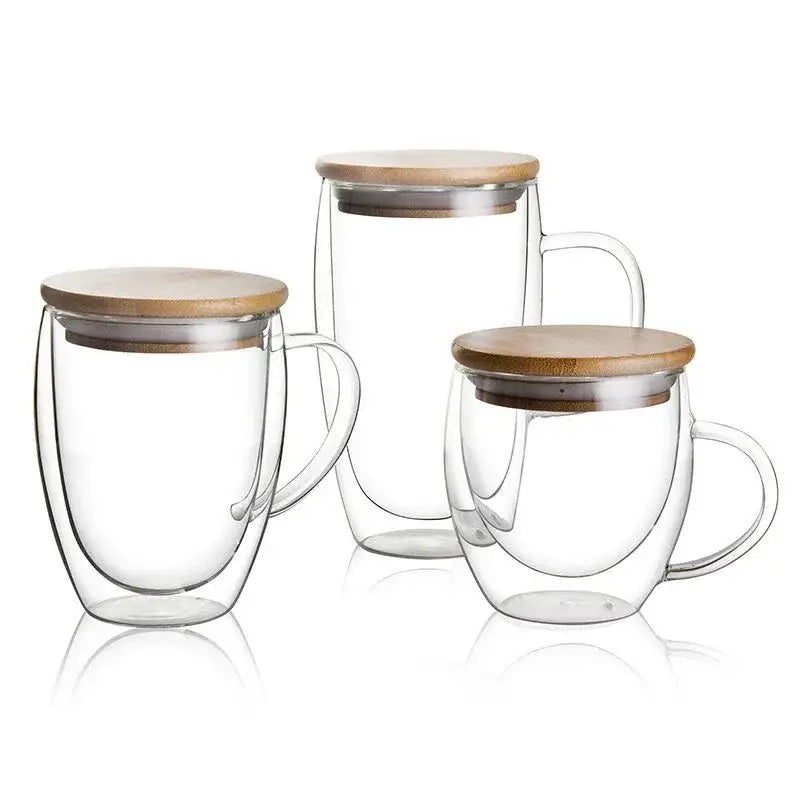 Set of three clear double wall tumblers with bamboo lids for dining room use in modern tumbler set design