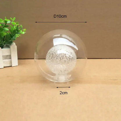 Modern clear and frosted glass shade cover replacement featuring a clear glass sphere with glittery inner ball