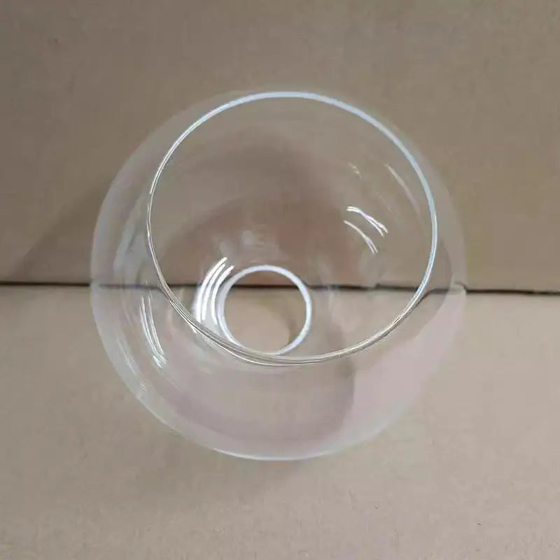 Modern clear glass ball lampshade with a smooth rounded dome and central opening for living room pendant lights afralia glass ball