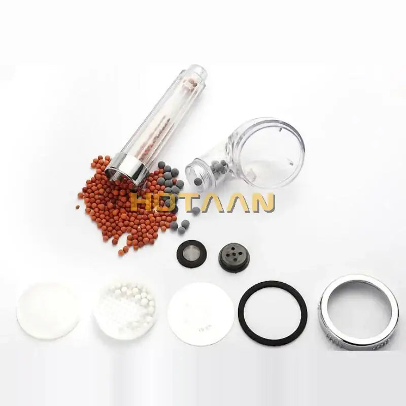 Modern clear glass crystal anion handheld shower head bathroom filter with stainless steel fittings and colored filter media