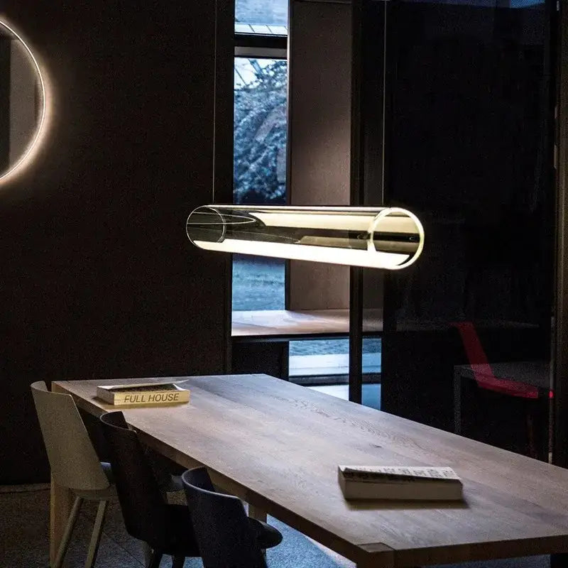 Modern clear glass cylinder chandelier pendant light with sleek minimalist design and warm ambient glow for dining room decorbites clear glass
