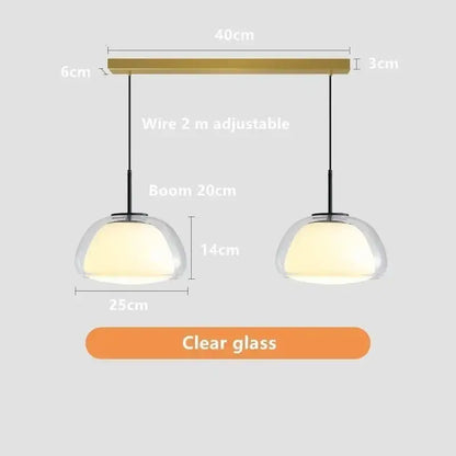 Modern clear glass jelly pendant lamp with brass-finished bar featuring two domes for living room and dining room