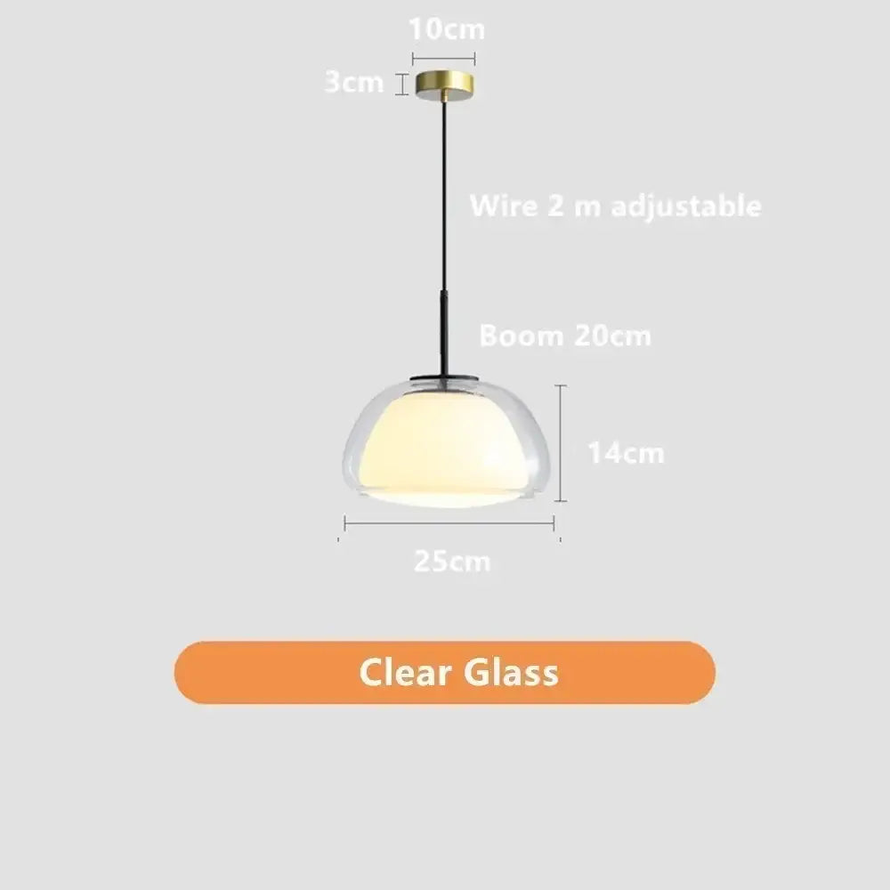 Modern clear glass jelly pendant lamp with brass-finished top and black wire suspension for living room lighting