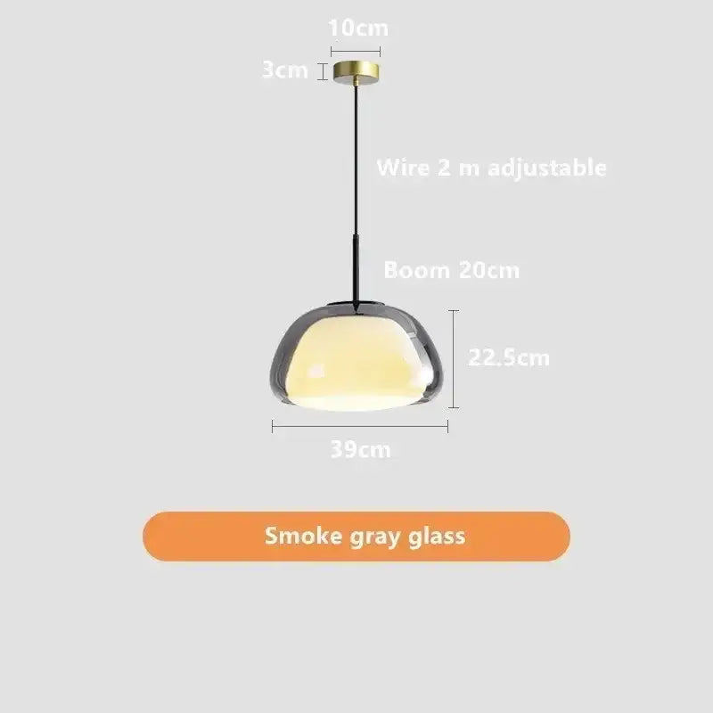 Modern jelly pendant lamp with sleek smoke gray glass shade and brass ceiling mount for living room or dining room