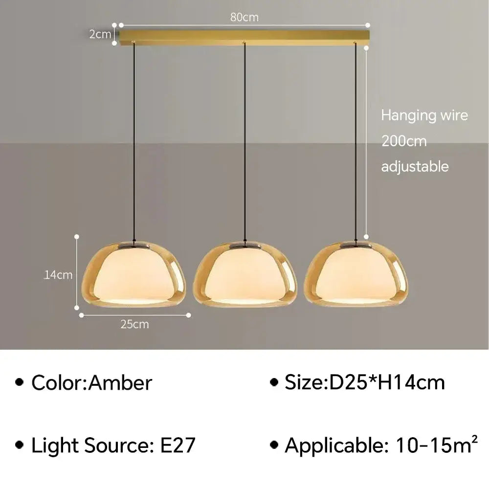 Set of three amber glass jelly pendant lamps with modern minimalist design for living room and dining room use