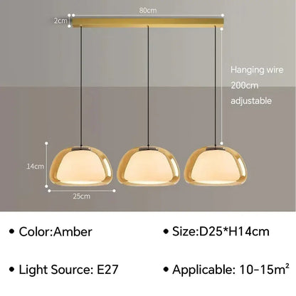 Set of three amber glass jelly pendant lamps with modern minimalist design for living room and dining room use