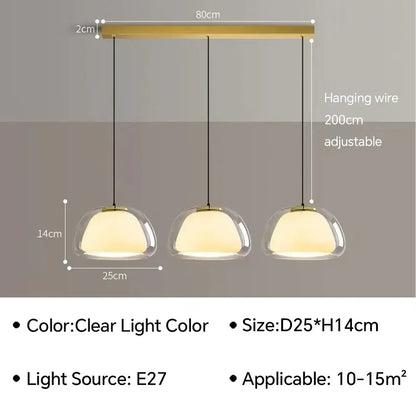 Modern jelly pendant lamp with three clear glass domes and gold-toned horizontal bar for living room or dining room