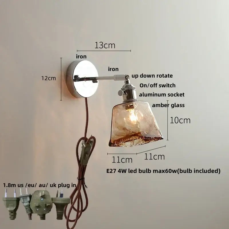 Modern clear glass wall lamp with polished iron base and amber glass shade perfect for bedroom decorbites clear glass