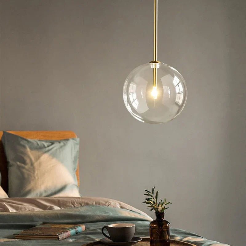 Modern Clear Glass Pendant Light With Gold Finish - Decorbites