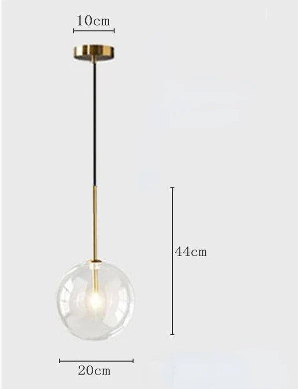 Modern Clear Glass Pendant Light With Gold Finish - Decorbites