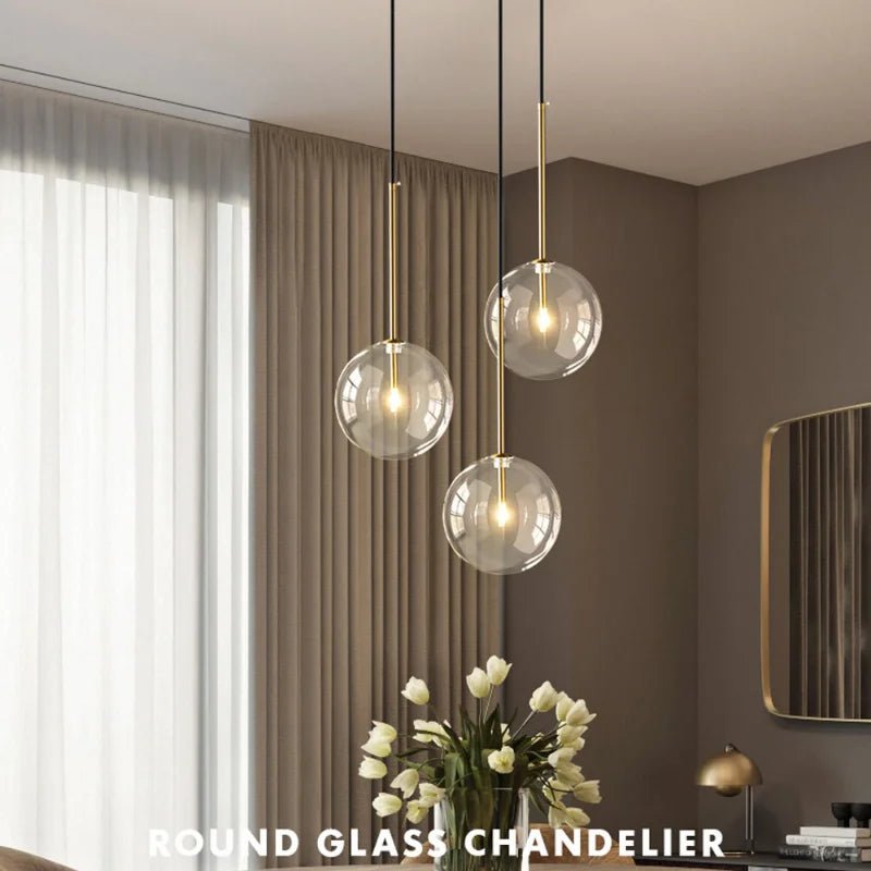 Modern Clear Glass Pendant Light With Gold Finish - Decorbites