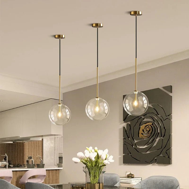 Modern Clear Glass Pendant Light With Gold Finish - Decorbites