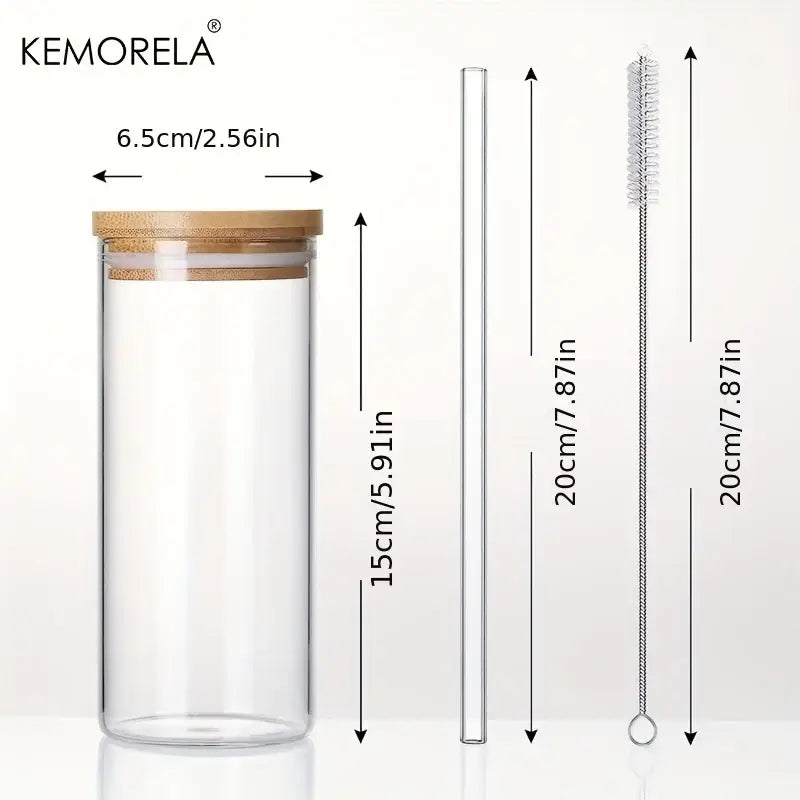 Modern clear glass tumbler cups set featuring a clear glass tumbler with bamboo lid, straw, and cleaning brush