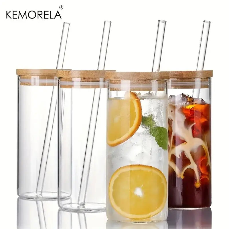 Modern clear glass tumbler cups with bamboo lids and clear straws featuring a sleek design in a 4-piece set