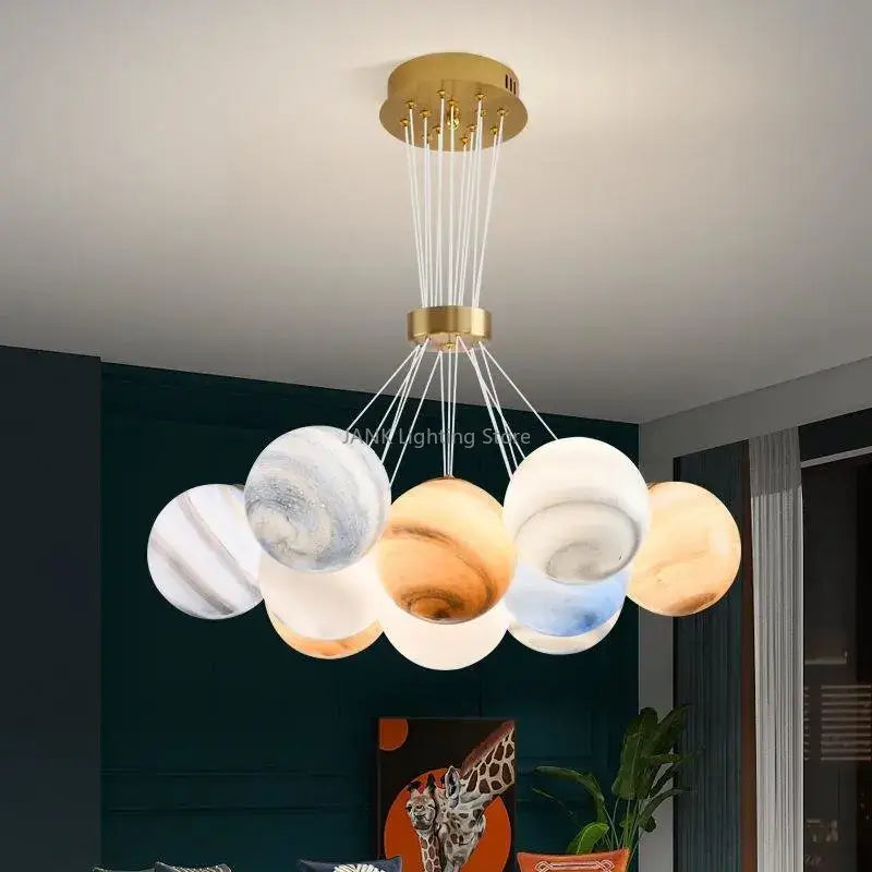 Modern cloud bubble ball pendant chandelier with gold-toned spherical glass shades suspended by white cords for children room decorbites bubble ball
