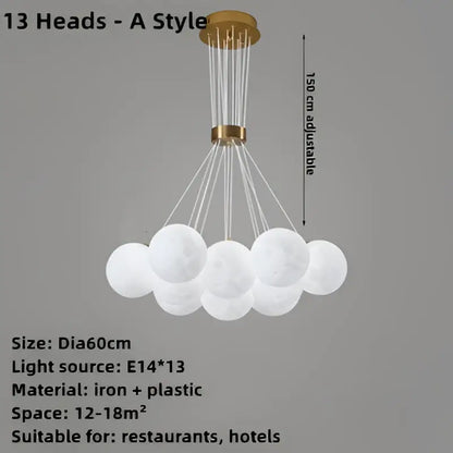Modern white spherical ball pendant chandelier with gold-toned fixture and adjustable height for children room decorbites bubble ball