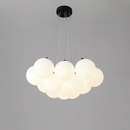 Modern cloud pendant light featuring frosted bubble glass ball spheres with a black ceiling mount for living room decorbites bubble glass