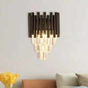 Modern black metal coffee crystal wall light featuring vertical tubes and cascading faceted glass for living room use