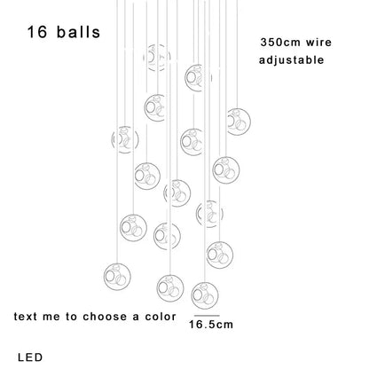 A modern decorbites colorful balls chandelier with 16 glass spheres suspended from an adjustable wire for dining room decor