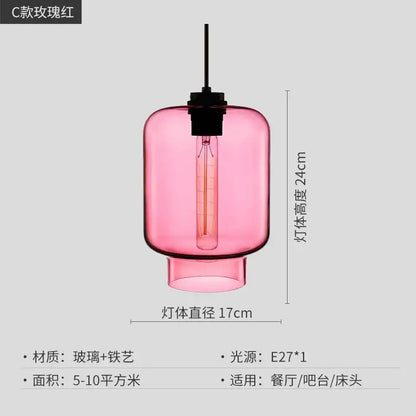 A modern pink translucent glass pendant light with black metal fixture and exposed edison bulb for kitchen decorbites geometric glass