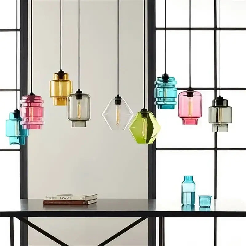 Modern colorful geometric glass pendant lights with exposed filament bulbs and black cords for kitchen lighting decorbites geometric glass