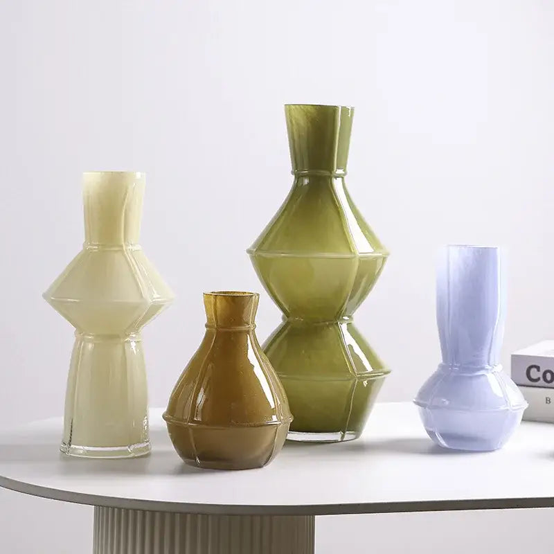 Set of five modern colorful geometric glass vases in muted pastel and earthy tones for living room decorbites colorful geometric