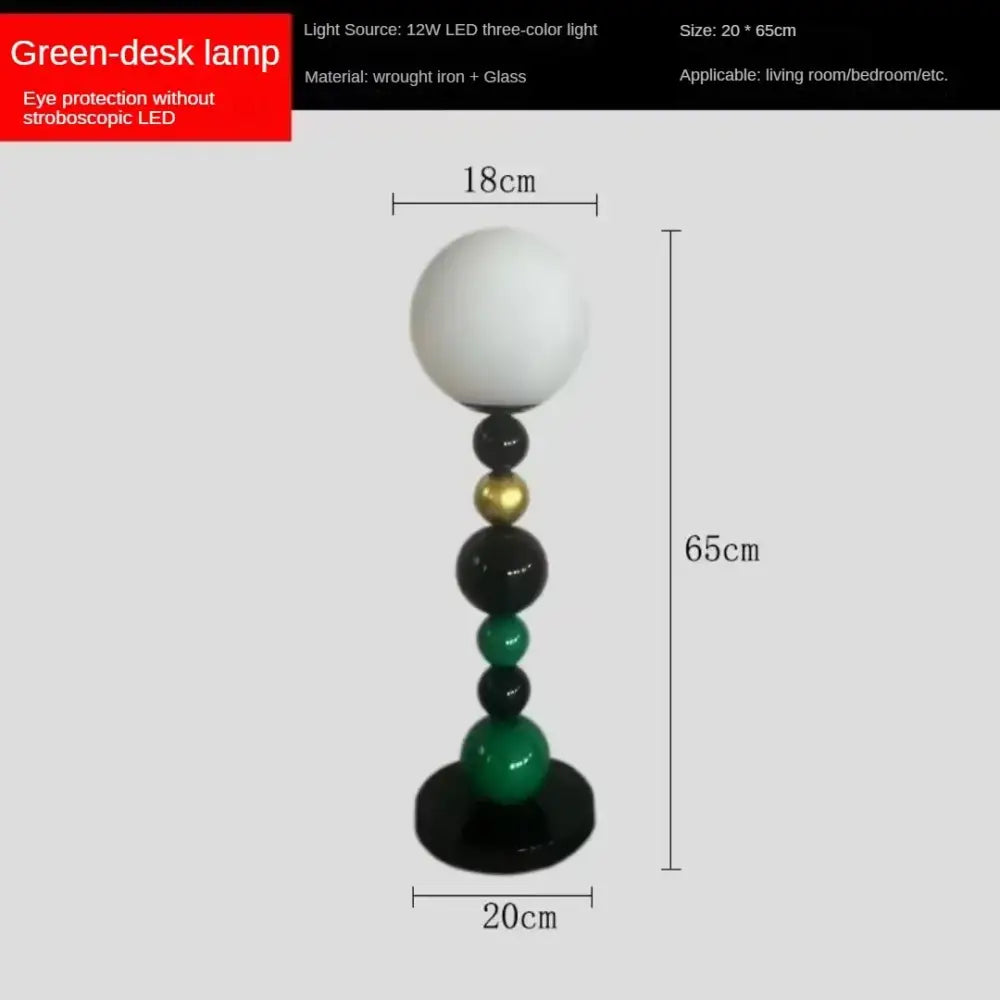 Modern colorful glass ball floor lamp with green desk lamp style, white glass globe, and black gold emerald beads on wrought iron base