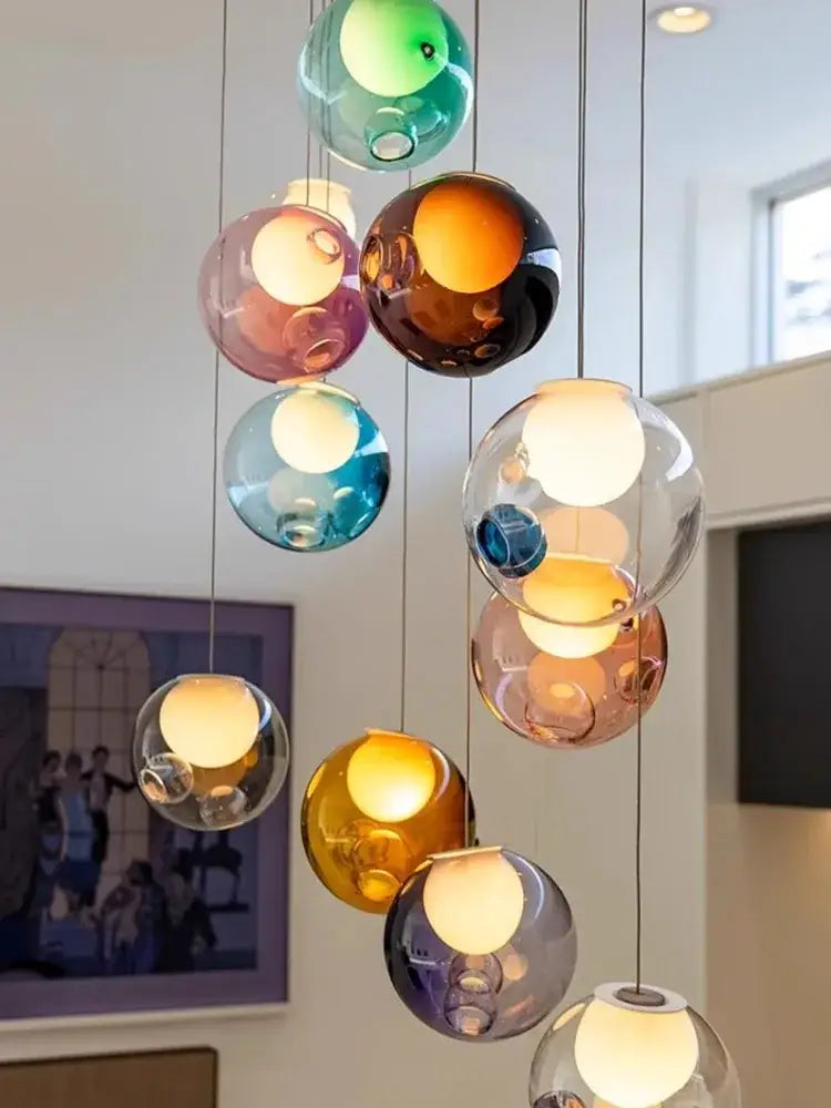Modern colorful glass ball pendant light featuring multiple glowing spheres for dining room decorbites glass ball design