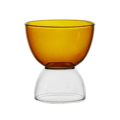 A modern amber glass dessert ice cream cup with a clear glass base featuring a minimalist design