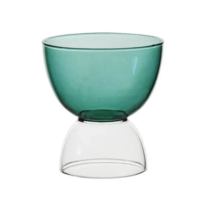 A modern two-part glass dessert ice cream cup with a translucent teal upper section and clear glass base