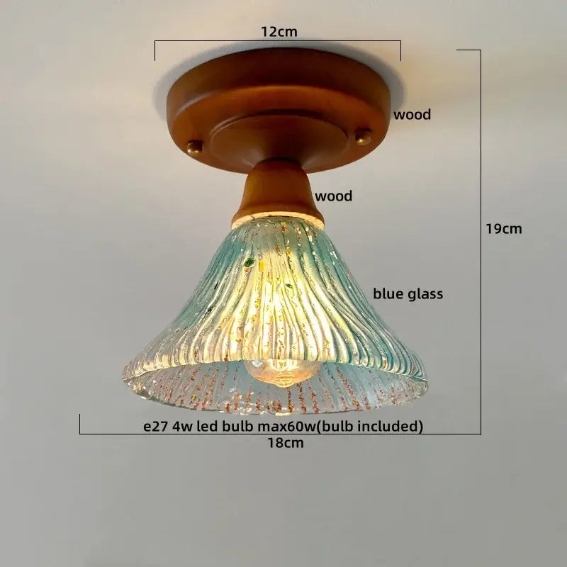 Modern colorful glass led ceiling lamp with a warm wood base and translucent blue decorbites colorful glass shade