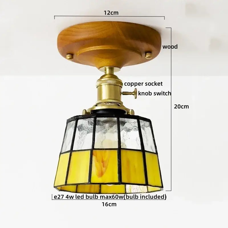 Vintage-style decorbites colorful glass ceiling lamp with warm amber shade and brass-finished socket on wood base
