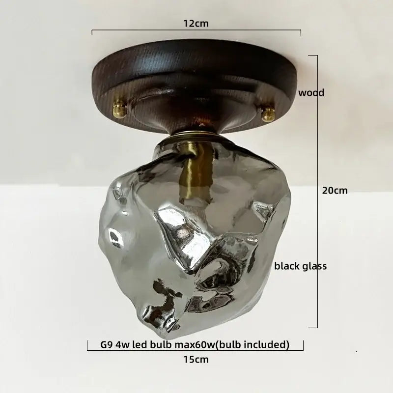 A sleek black glass ceiling lamp with dark wood mount and brass accents from decorbites colorful glass led collection