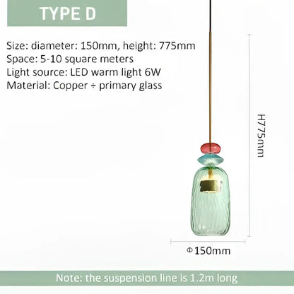 A delicate teal glass led pendant chandelier with copper finish and red accent bead for kitchen and dining room