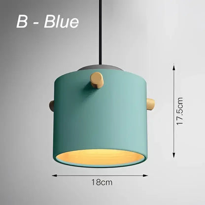 Teal cylindrical modern colorful led pendant light with wooden knobs and warm yellow interior for dining room decorbites colorful led