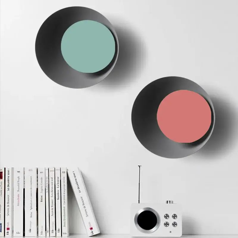 Modern colorful rotatable led wall lamp with teal and coral bowls and matte black exteriors for bedroom and living room