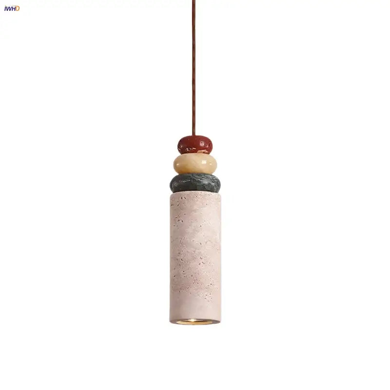 Modern pendant light with a beige concrete cylinder topped by colorful stone led in red yellowish beige and dark gray for dining room decorbites colorful stone