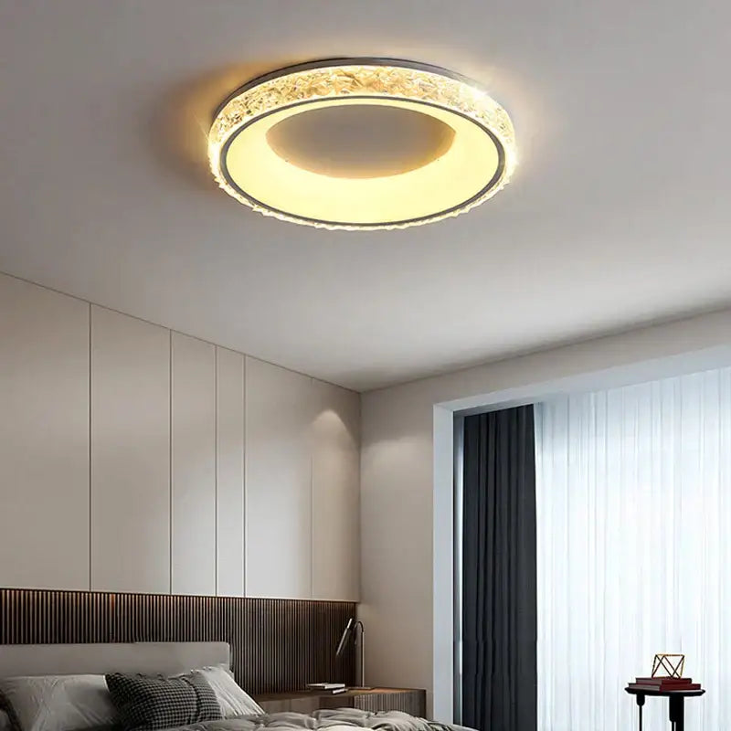 Modern concave round ceiling light with warm glow featuring textured crystal outer ring and sleek metallic frame for living room decorbites concave round