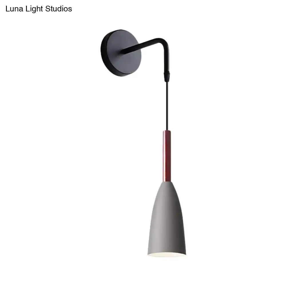 Modern conical black wall lamp with matte black base, curved arm, gray shade with red stripe, 12 inch fixture for bedroom