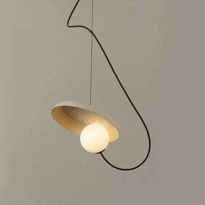 Modern copper and black grid led pendant light with matte white and gold shade featuring spherical bulb for dining room decorbites grid led