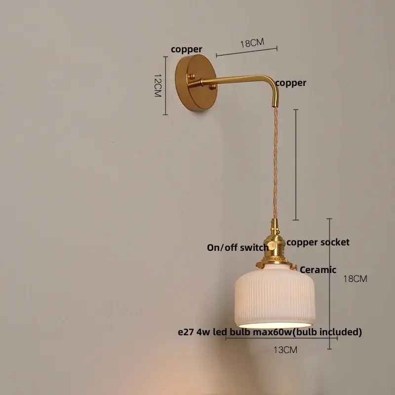 Modern copper and off-white ribbed wall light fixture featuring a ceramic lampshade ideal for bedroom lighting