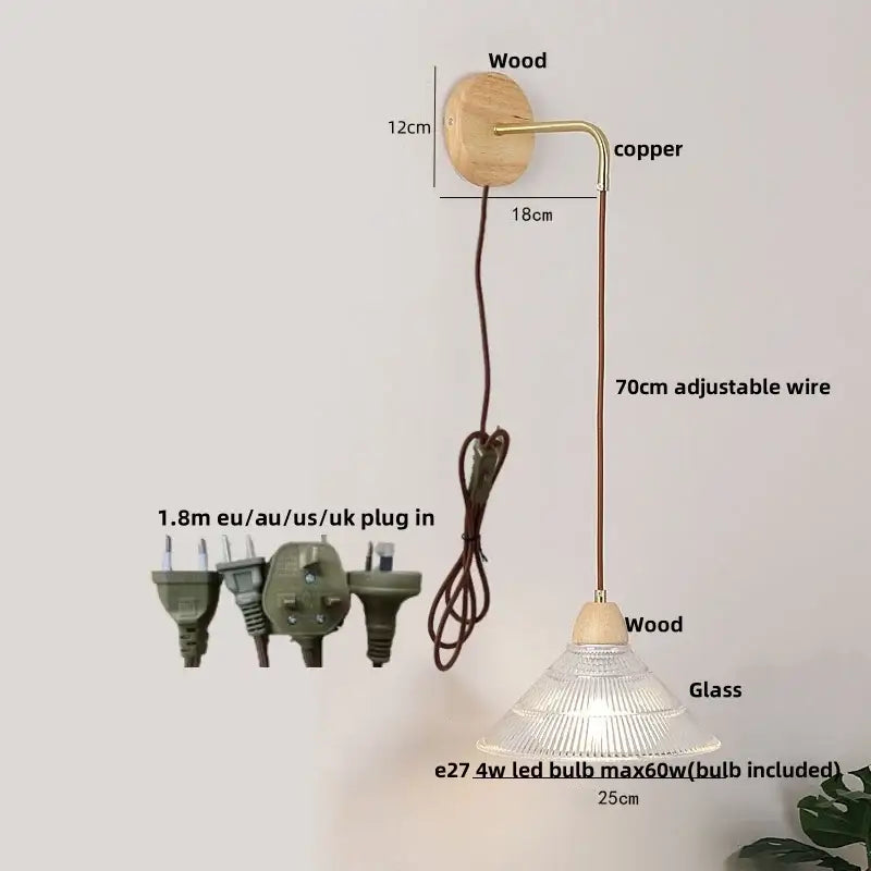 Modern copper and wood wall sconce with natural wood base, copper arm, clear glass shade, and pull chain switch