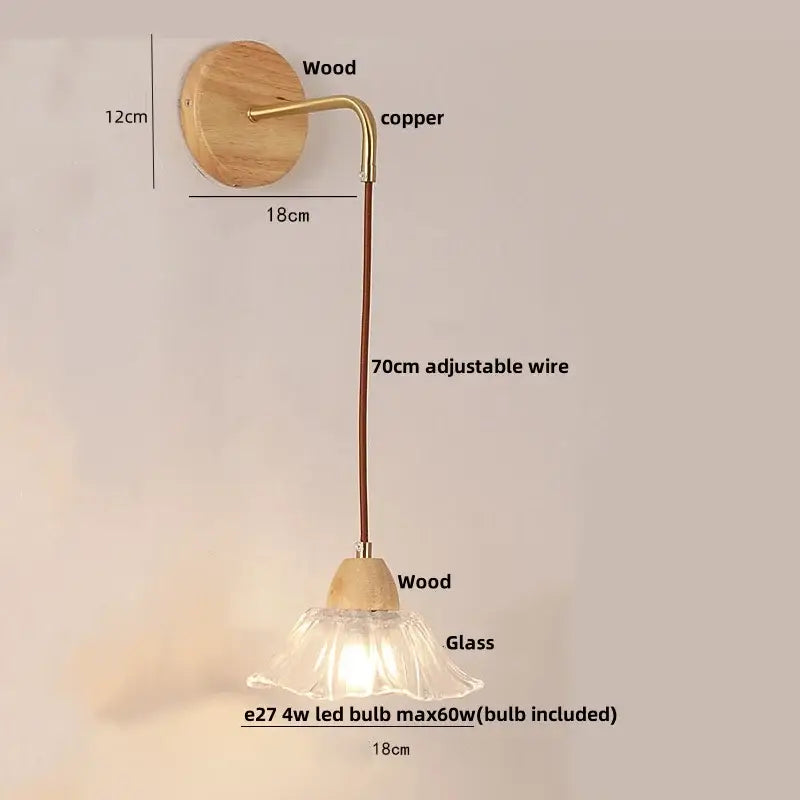 Modern copper and wood wall sconce with clear glass bell shade and adjustable pull chain switch for rustic lighting