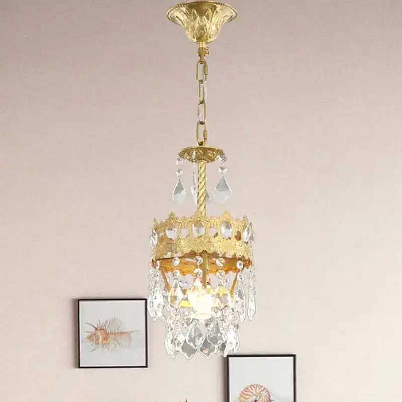 Modern copper crystal chandelier featuring gold-toned filigree and clear crystal droplets for decorbites copper crystal lighting