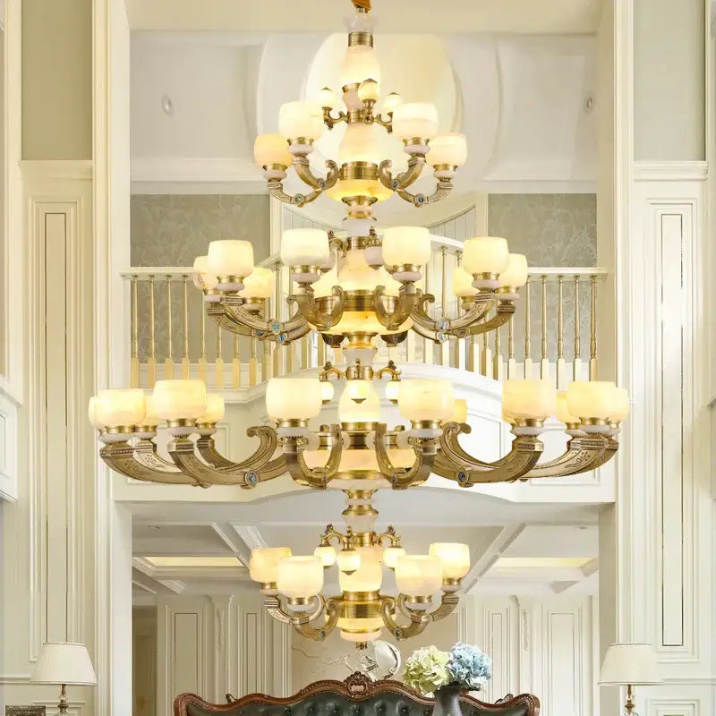 Modern copper jade chandelier featuring gold-toned multi-tiered design with frosted glass shades for living room lighting