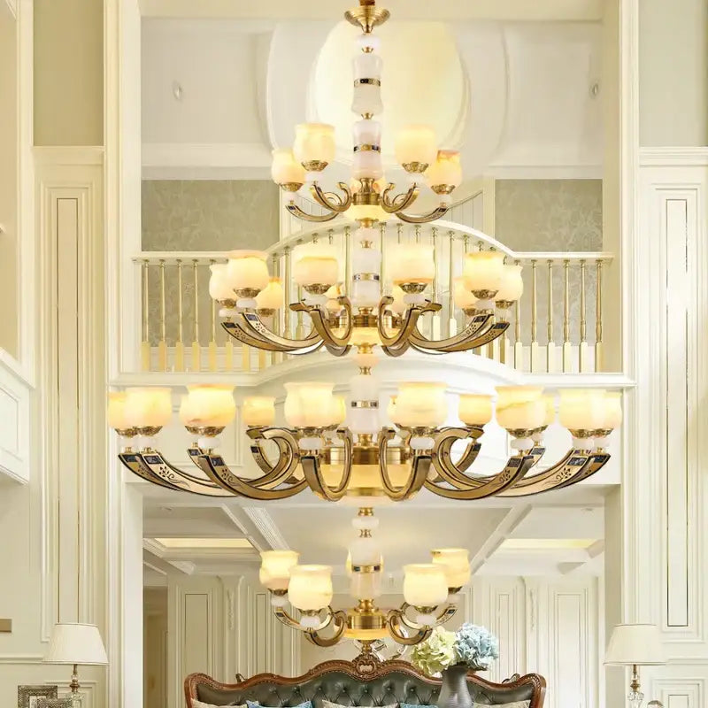 Modern copper jade pendant lamp with gold-toned metal arms and white opaline glass shades for dining room decor