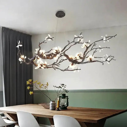 Modern decorbites copper led branch chandelier in black wrought iron with glowing white flowers for dining room decor