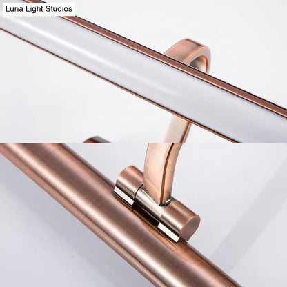 Modern copper linear led bathroom vanity sconce light with copper-finished metal towel rack and sleek polished surface
